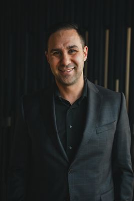 Portrait of Chris Karampelas, Associate.